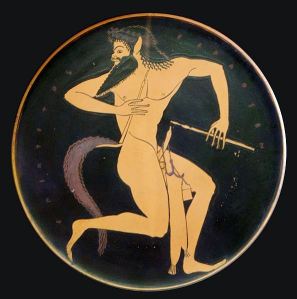 Satyr with pipe and a pipe case (Attic red-figure plate, 520–500 BC, from Vulci, Etruria